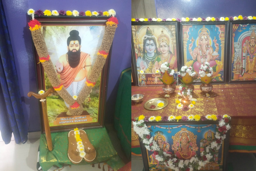 A Nadi reader explaining a palm leaf reading to a client